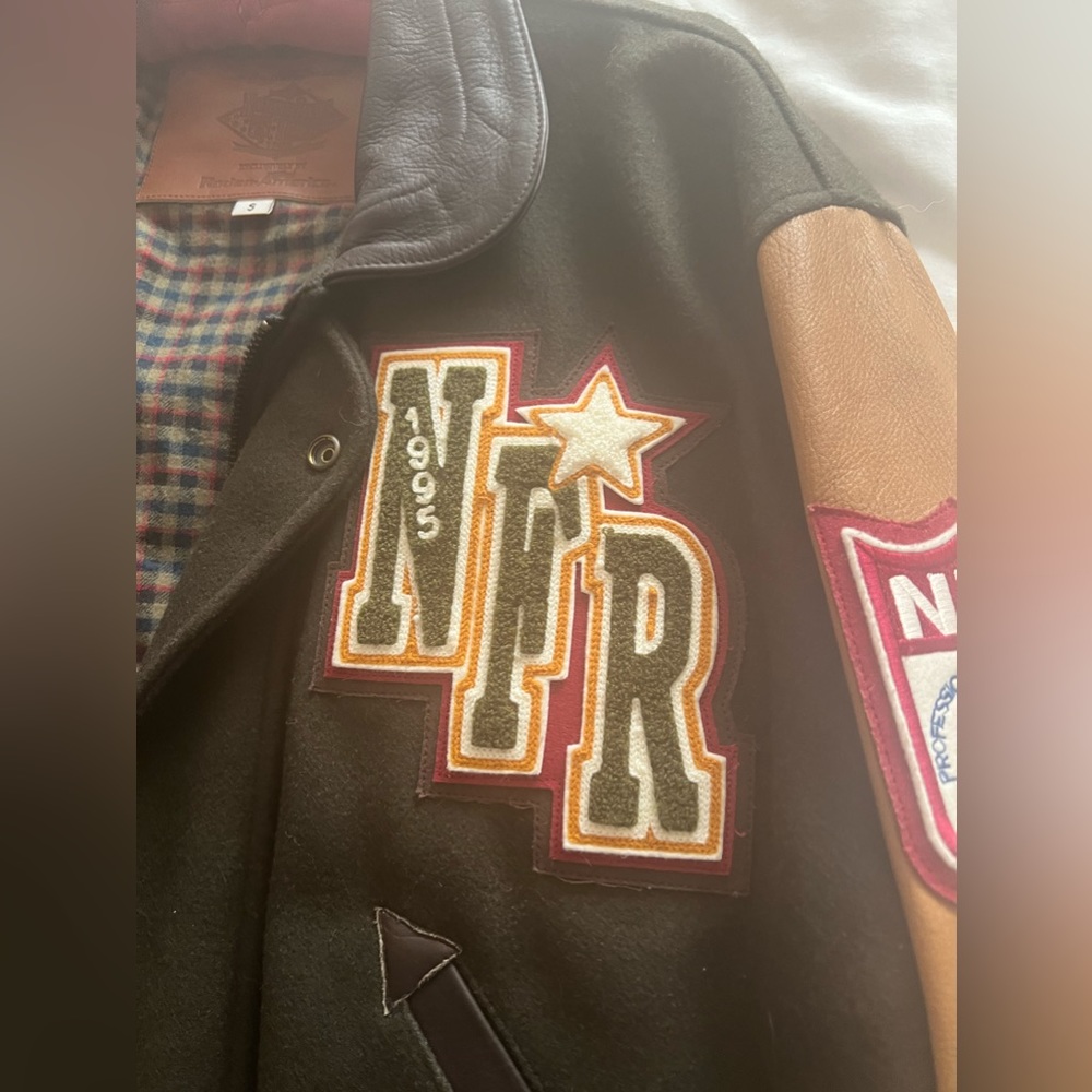 National finals rodeo leather jacket.